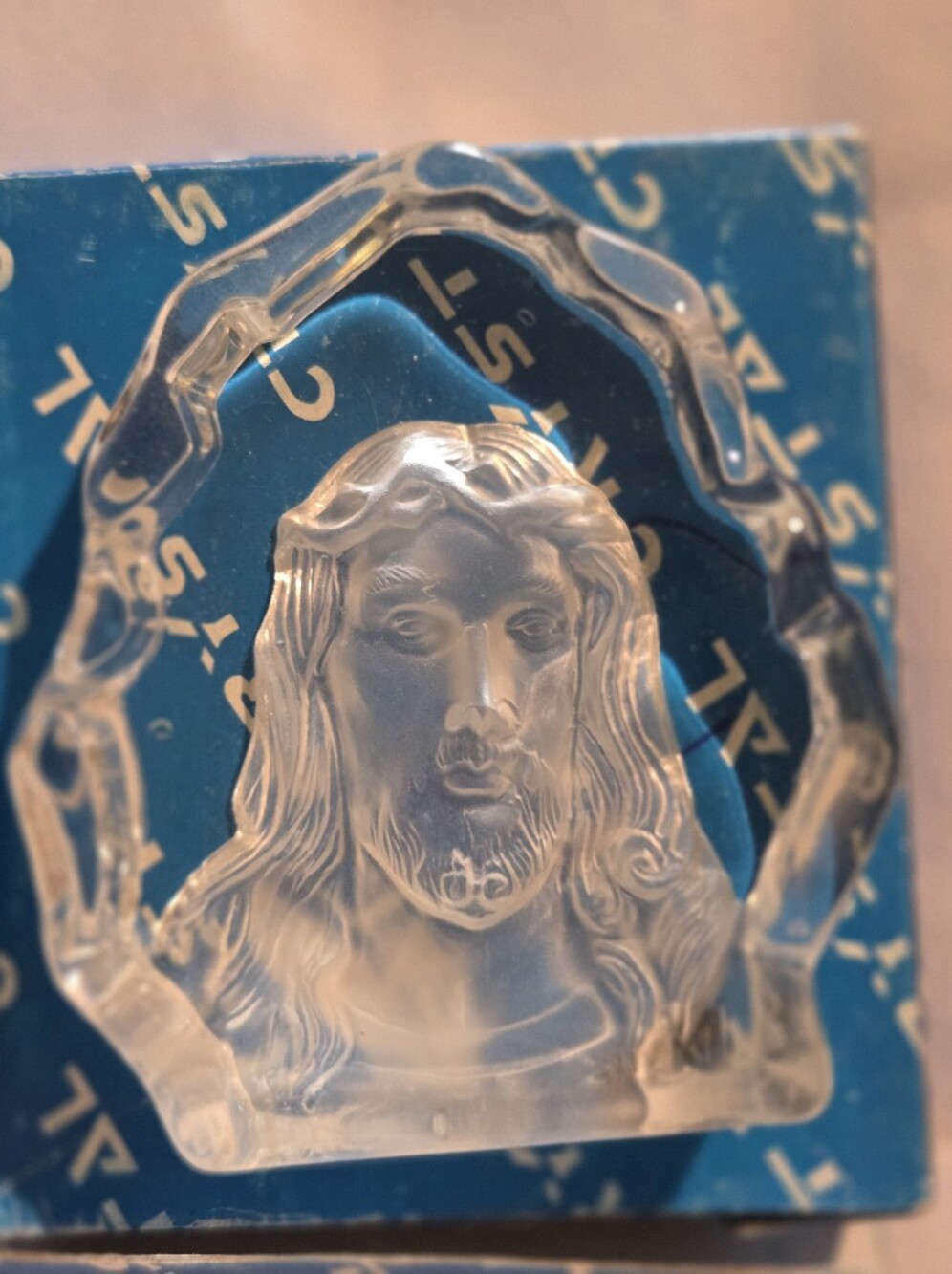 Clear Glass Jesus Face Decorative Accent on Teal Backing